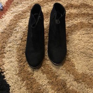 Women’s black suede heeled bootie